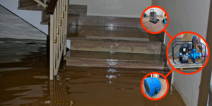 Stair area in a flooded house and water extraction systems in action.